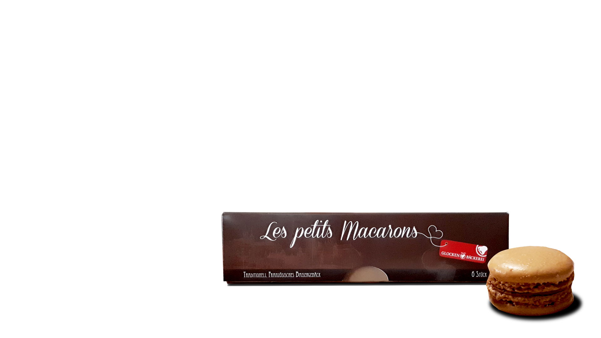 Macaron-Verpackung geschlossen mit Macaron davor. Rechts unten vor transparentem Hintergrund