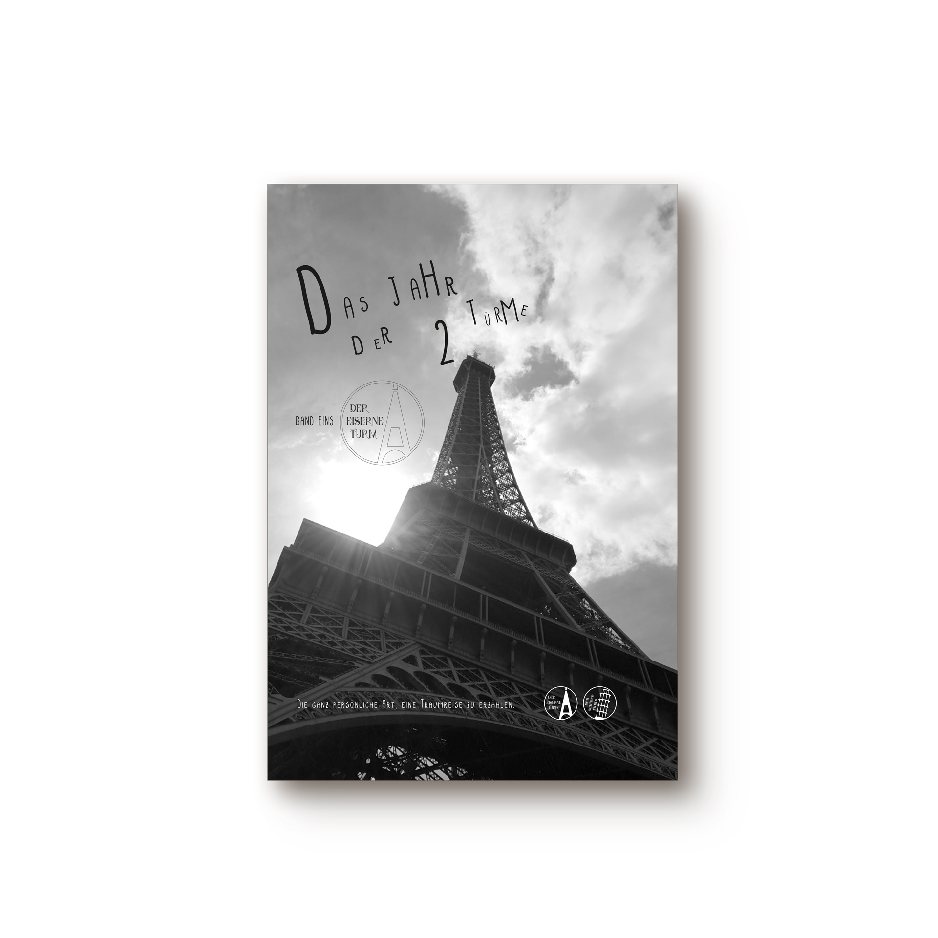 Reisebuch Paris, Titel: Das Jahr der 2 Türme, Band 1, der Eiserne Turm. Man sieht auf dem titel eine schwarz weiß Aufnahme des Eiffelturms